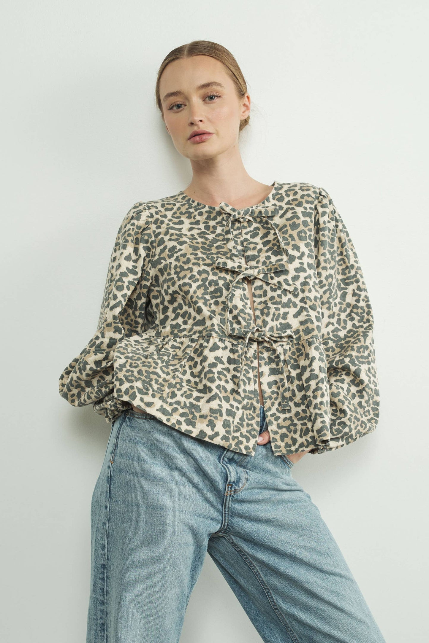 ANIMAL PRINT BOW TIE BLOUSE