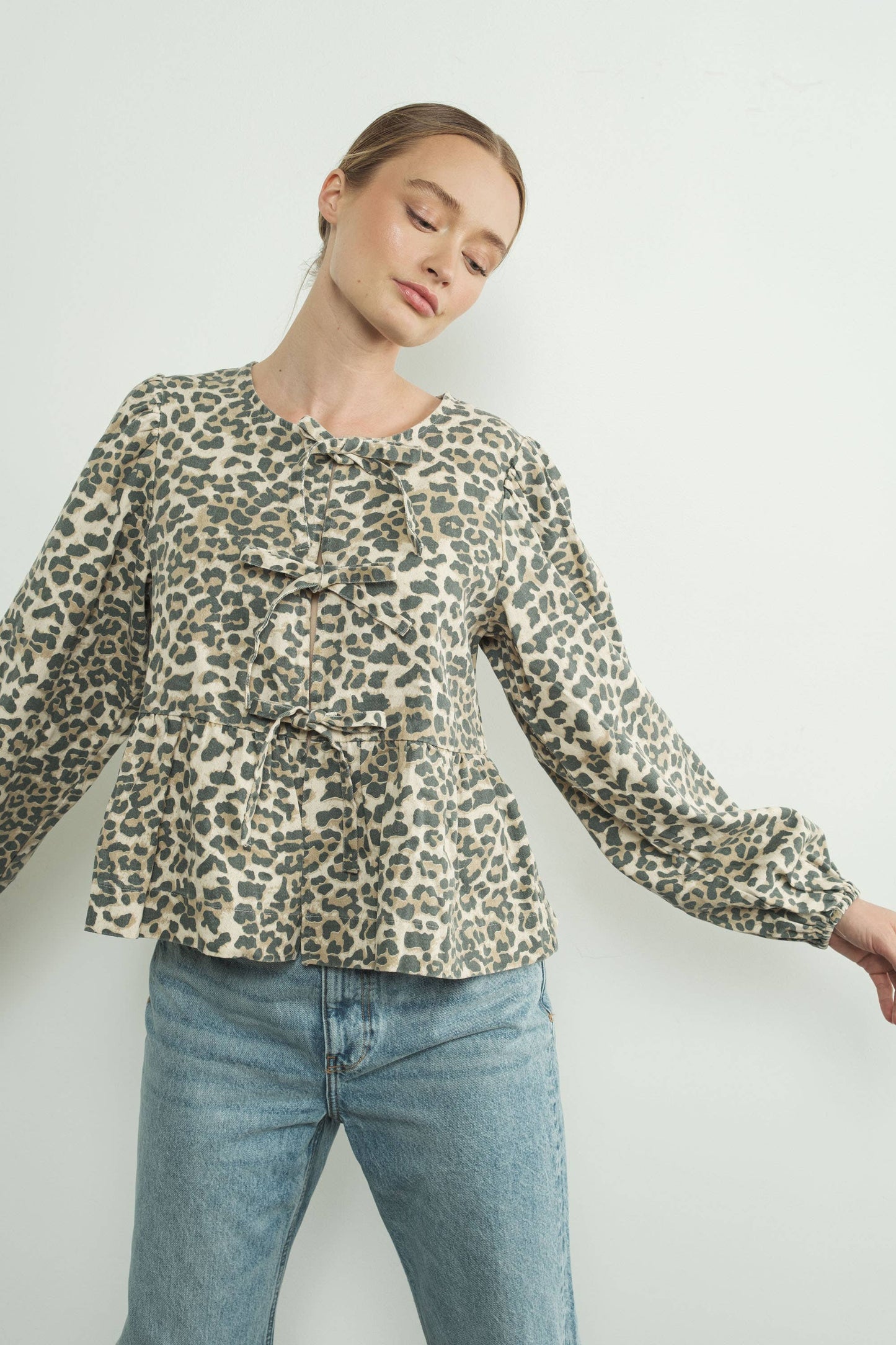 ANIMAL PRINT BOW TIE BLOUSE