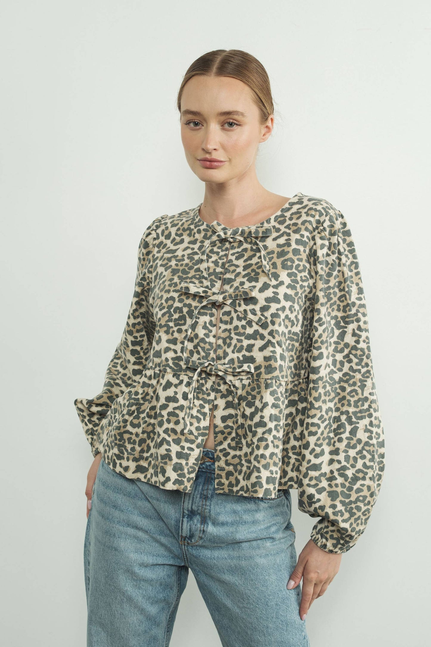 ANIMAL PRINT BOW TIE BLOUSE