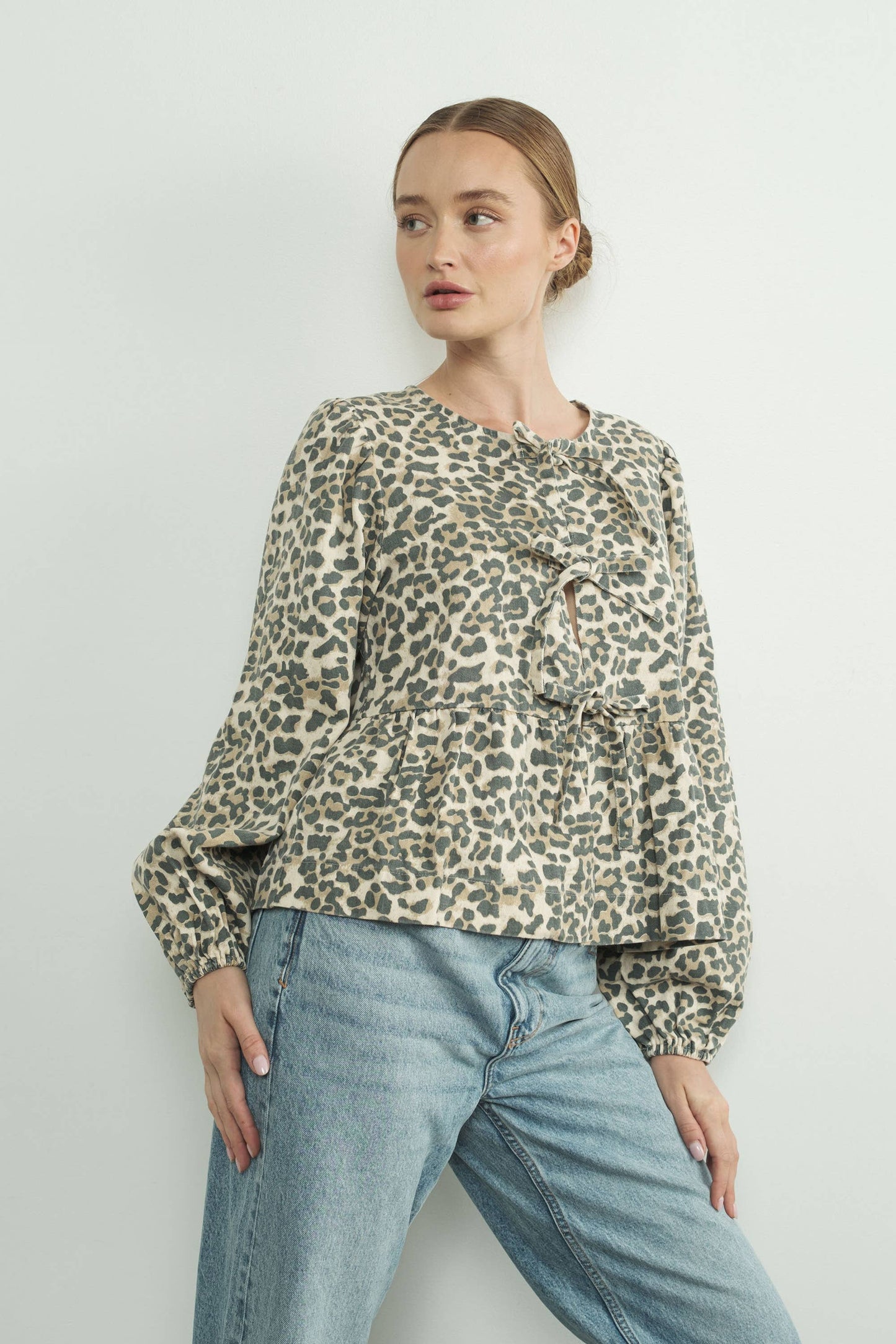 ANIMAL PRINT BOW TIE BLOUSE