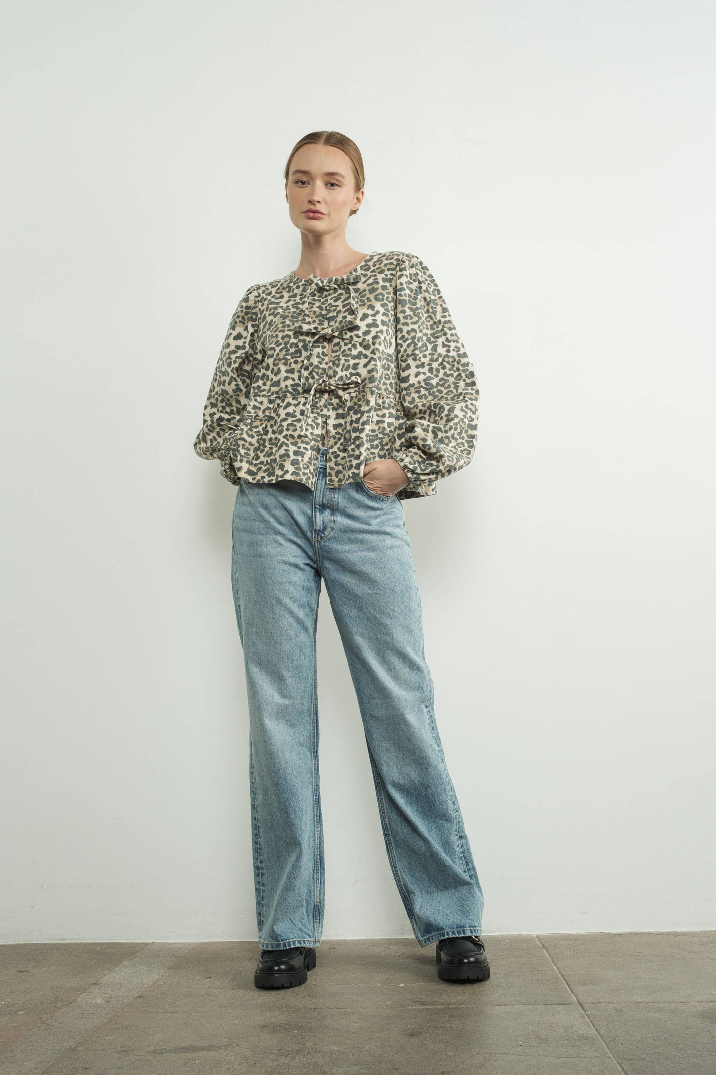 ANIMAL PRINT BOW TIE BLOUSE